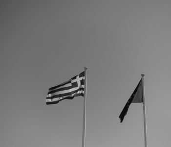 Flags of Greece and the EU in black and white