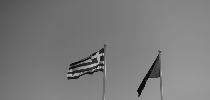 Flags of Greece and the EU in black and white