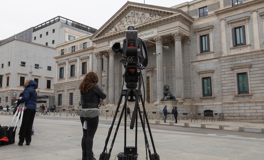 Journalist outside Congress of Deputies, Madrid, Spain, 28 October, 2020. Credit: alvarobueno/Shutterstock