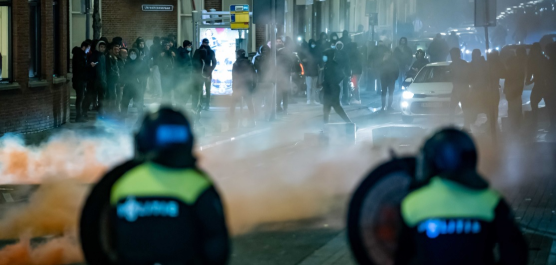 A large group of young people pelts the police present with stones and fireworks in Rotterdam, The Netherlands, 25 January 2021. EPA-EFE / Killian Lindenburg / MediaTV