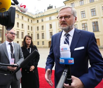 Czech Republic's Prime Minister Petr Fiala speaks with the media as he arrives for an EU Summit at Prague Castle in Prague, Czech Republic, Friday, Oct 7, 2022.