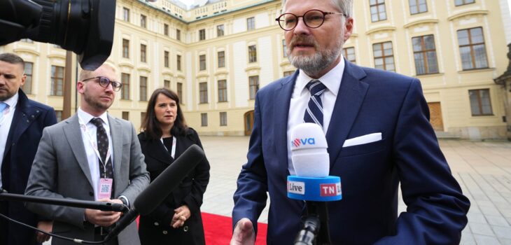 Czech Republic's Prime Minister Petr Fiala speaks with the media as he arrives for an EU Summit at Prague Castle in Prague, Czech Republic, Friday, Oct 7, 2022.